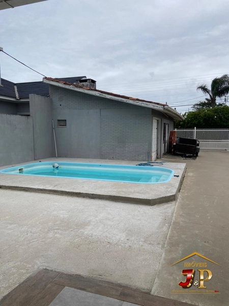Casa com 2 dormitórios, quiosque e piscina: 22ª foto da galeria de imagens do imóvel