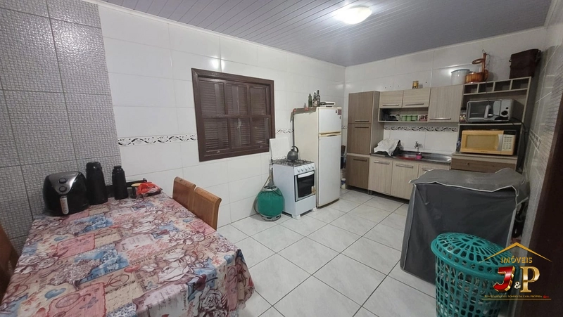 Casa 4 dormitórios no bairro Santa Luzia: 2ª foto da galeria de imagens do imóvel