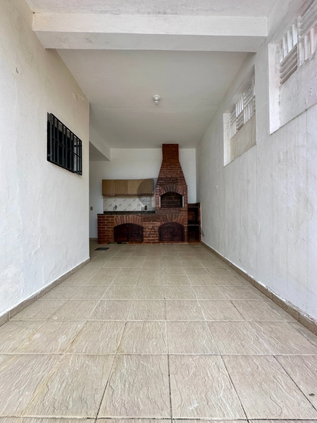 Casa geminada na Praia Grande no bairro Imperador.: 5ª foto da galeria de imagens do imóvel