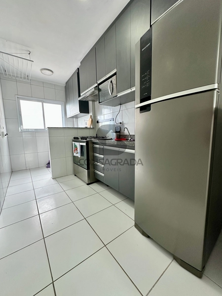 Apartamento na Praia Grande no Bairro Vila Mirim.: 5ª foto da galeria de imagens do imóvel