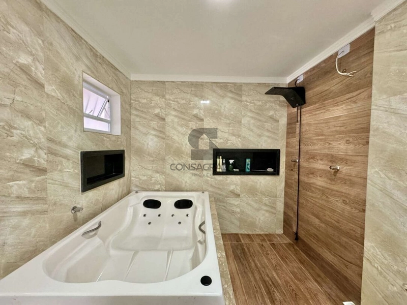 Casa na Praia Grande no Bairro Vila Tupi.: 2ª foto da galeria de imagens do imóvel