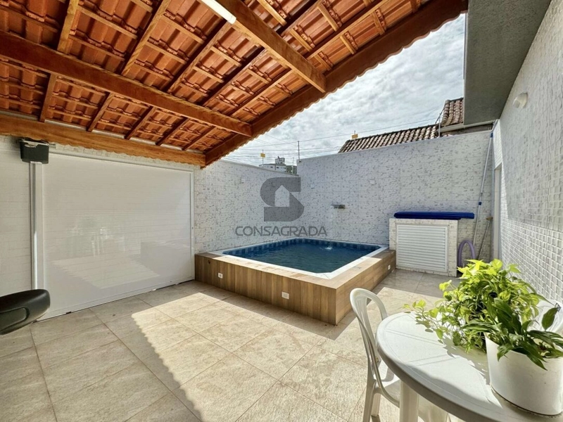 Casa na Praia Grande no Bairro Vila Tupi.: 3ª foto da galeria de imagens do imóvel