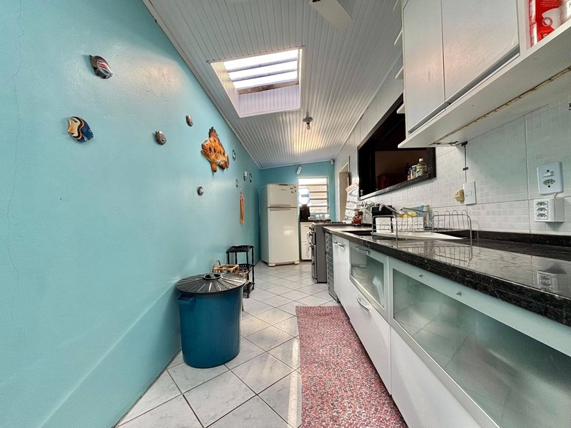 CASA TÉRREA EM ESQUINA NORTE OESTE A TRÊS QUADRAS DO MAR: 8ª foto da galeria de imagens do imóvel