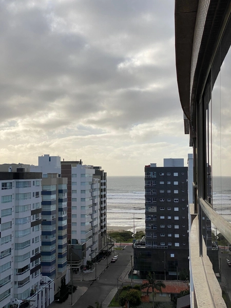 APARTAMENTO AMPLO MOBILIADO COM VISTA PARA O MAR E ÓTIMA POSIÇÃO SOLAR: 1ª foto da galeria de imagens do imóvel