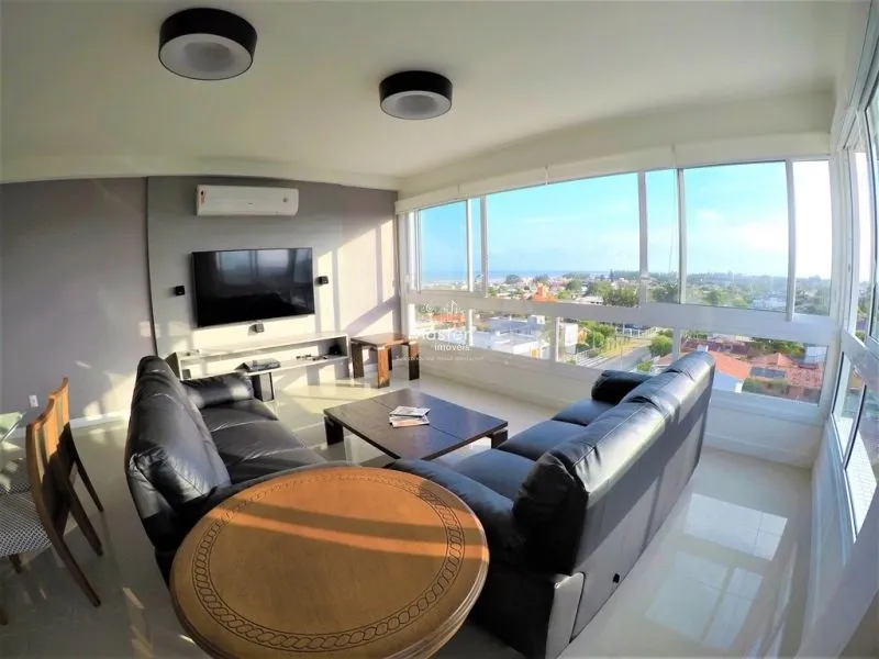 Apartamento de 4 dormitórios em Capão da Canoa: 1ª foto da galeria de imagens do imóvel