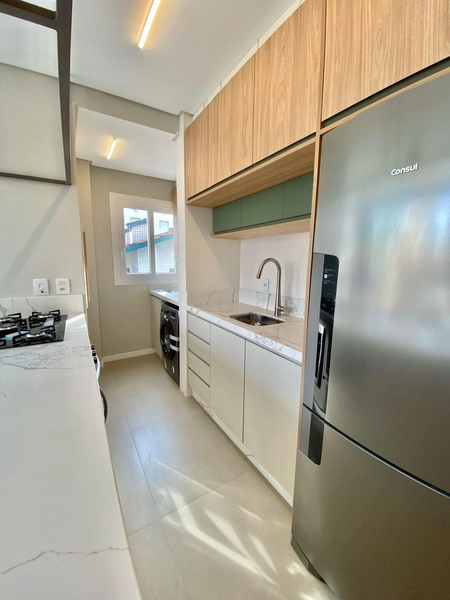 Excelente apartamento de três dormitórios a uma quadra do mar: 8ª foto da galeria de imagens do imóvel