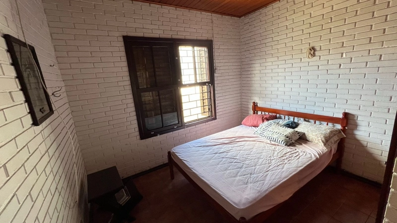 Casa 4 Dormitórios com Garagem: 16ª foto da galeria de imagens do imóvel