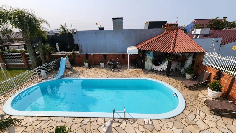 Casa 2 terrenos, piscina e quiosque gourmet: 1ª foto da galeria de imagens do imóvel