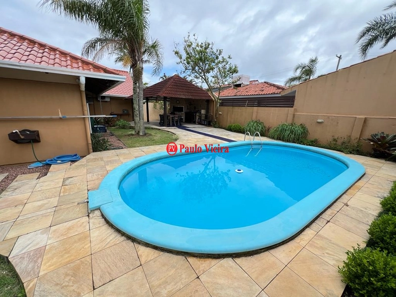 Casa com 4 dormitórios e piscina em Atlântida: 22ª foto da galeria de imagens do imóvel