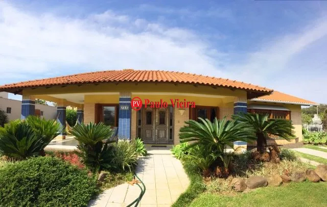 ATLÂNTIDA - EXCELENTE CASA TÉRREA DE ESQUINA: 1ª foto da galeria de imagens do imóvel