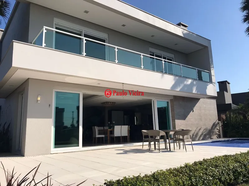 ENSEADA -  EXCELENTE SOBRADO BEIRA LAGO: 8ª foto da galeria de imagens do imóvel