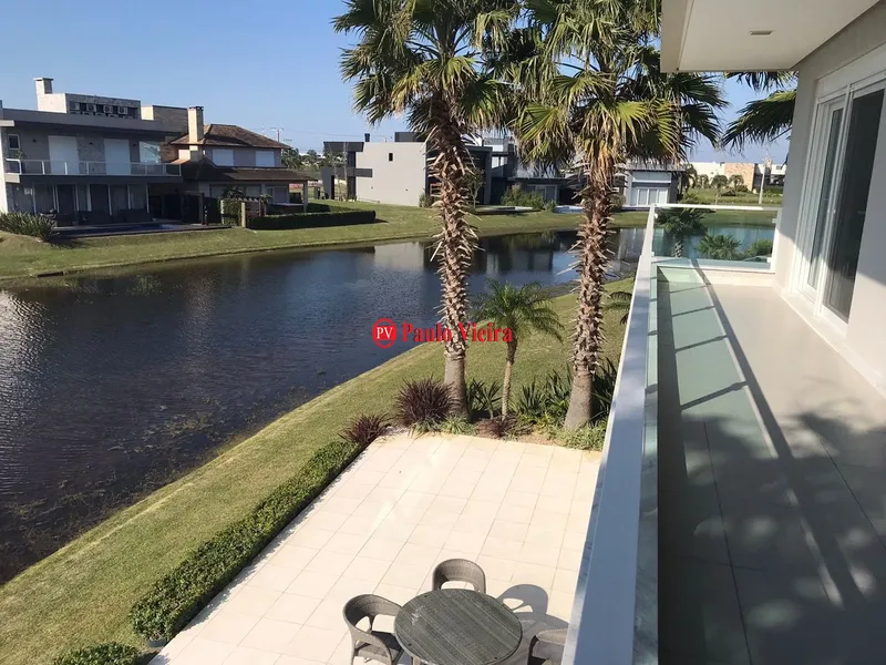 ENSEADA -  EXCELENTE SOBRADO BEIRA LAGO: 5ª foto da galeria de imagens do imóvel