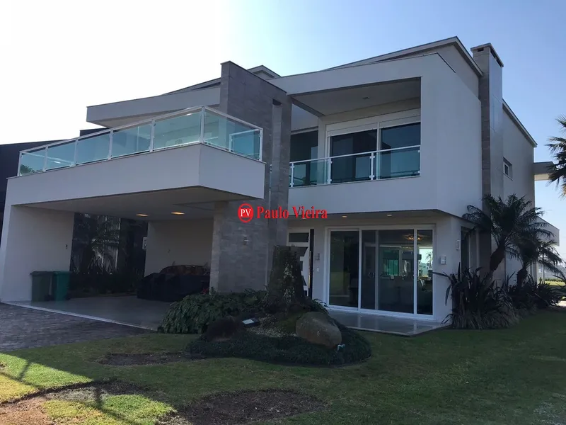 ENSEADA -  EXCELENTE SOBRADO BEIRA LAGO: 3ª foto da galeria de imagens do imóvel