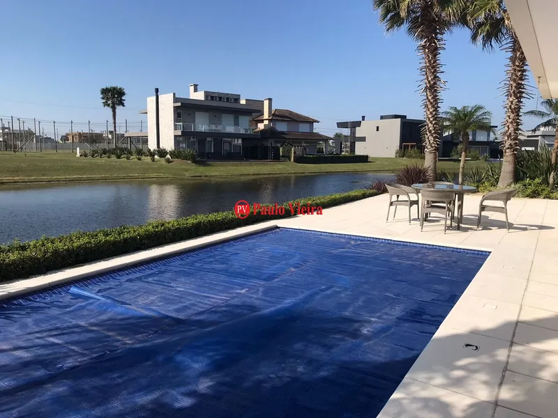 ENSEADA -  EXCELENTE SOBRADO BEIRA LAGO: 25ª foto da galeria de imagens do imóvel