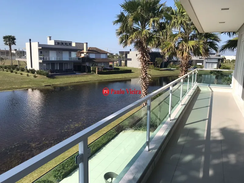 ENSEADA -  EXCELENTE SOBRADO BEIRA LAGO: 6ª foto da galeria de imagens do imóvel