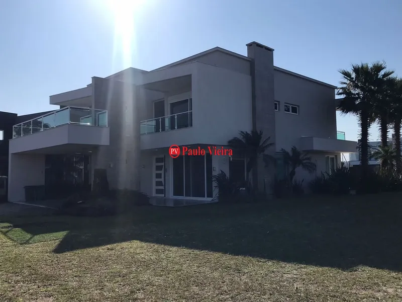 ENSEADA -  EXCELENTE SOBRADO BEIRA LAGO: 2ª foto da galeria de imagens do imóvel