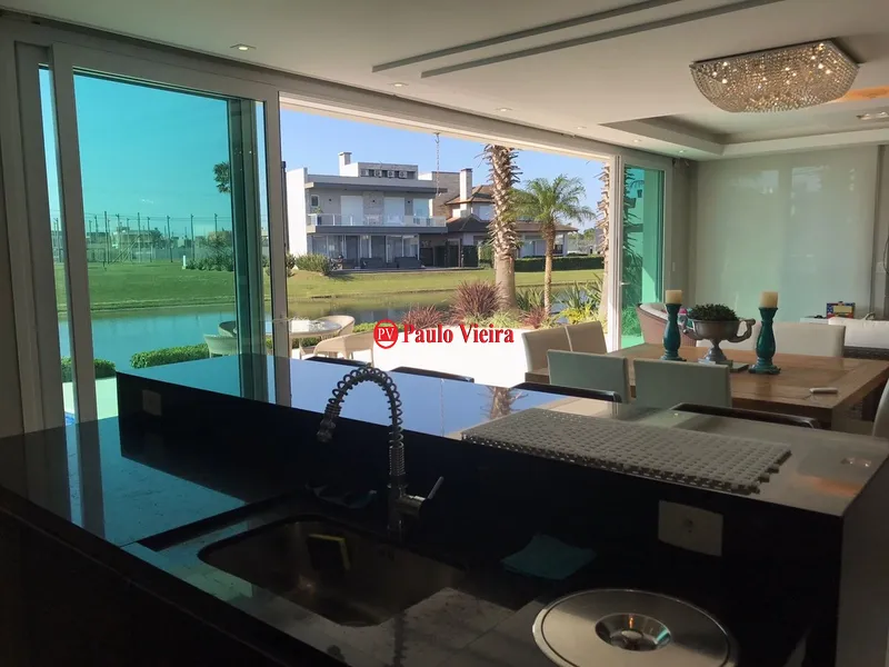 ENSEADA -  EXCELENTE SOBRADO BEIRA LAGO: 29ª foto da galeria de imagens do imóvel