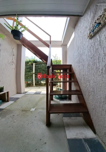 Casa com 4 dormitórios de esquina próximo ao mar: 9ª foto da galeria de imagens do imóvel