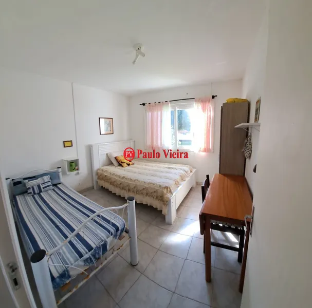 Casa com 4 dormitórios de esquina próximo ao mar: 14ª foto da galeria de imagens do imóvel