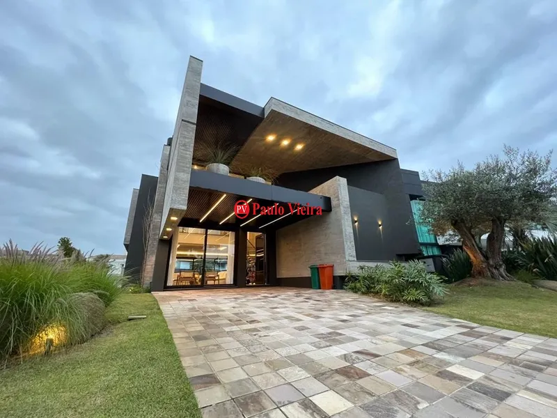 ENSEADA - EXCELENTE SOBRADO BEIRA LAGO: 3ª foto da galeria de imagens do imóvel