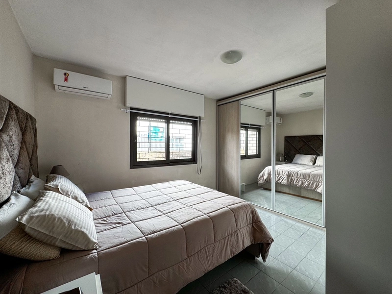 Casa com 4 dormitórios bem localizada em Capão da Canoa: 13ª foto da galeria de imagens do imóvel