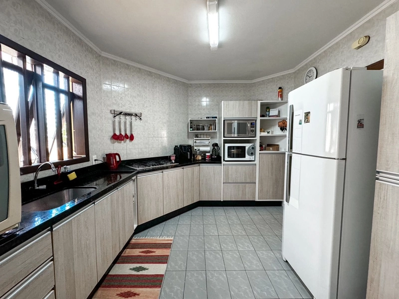 Casa com 4 dormitórios bem localizada em Capão da Canoa: 6ª foto da galeria de imagens do imóvel