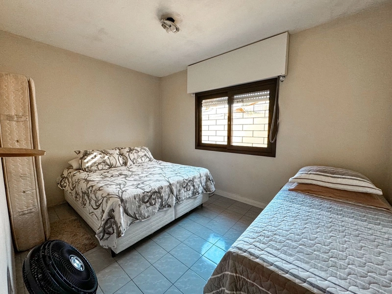 Casa com 4 dormitórios bem localizada em Capão da Canoa: 12ª foto da galeria de imagens do imóvel