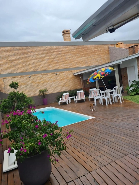 XANGRI-LÁ - CASA COM PISCINA AQUECIDA E 4 DORMITÓRIOS: 1ª foto da galeria de imagens do imóvel