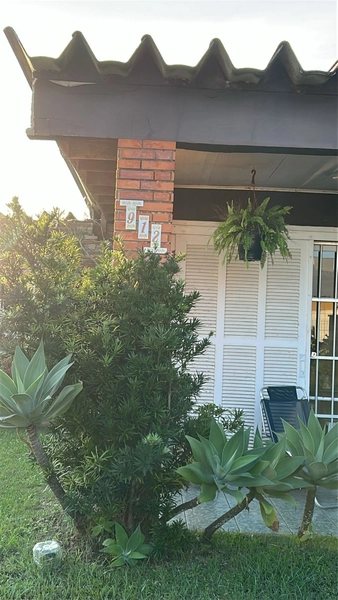 ATLÂNTIDA -  CASA TÉRREA FRENTE MAR EM LOCALIZAÇÃO EXCLUSIVA: 3ª foto da galeria de imagens do imóvel