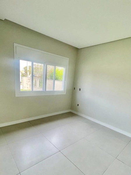 ATLÂNTIDA -  CASA TÉRREA EM ÓTIMA LOCALIZAÇÃO, FRENTE SUL: 13ª foto da galeria de imagens do imóvel