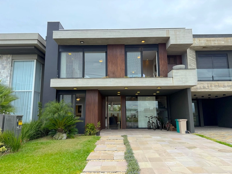 SUNSET - SOBRADO EM CONDOMINIO FECHADO COM 5 SUÍTES