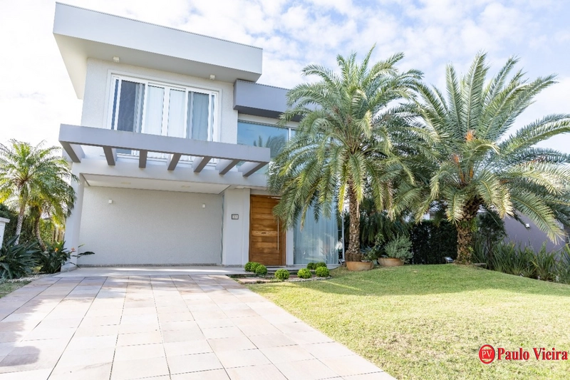 XANGRI-LÁ - CASA  BEIRA-LAGO, 4 SUÍTES, COM PISCINA AQUECIDA: 2ª foto da galeria de imagens do imóvel