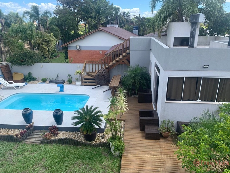 ATLÂNTIDA  - CASA COM 3 DORMITÓRIOS E PISCINA: 1ª foto da galeria de imagens do imóvel