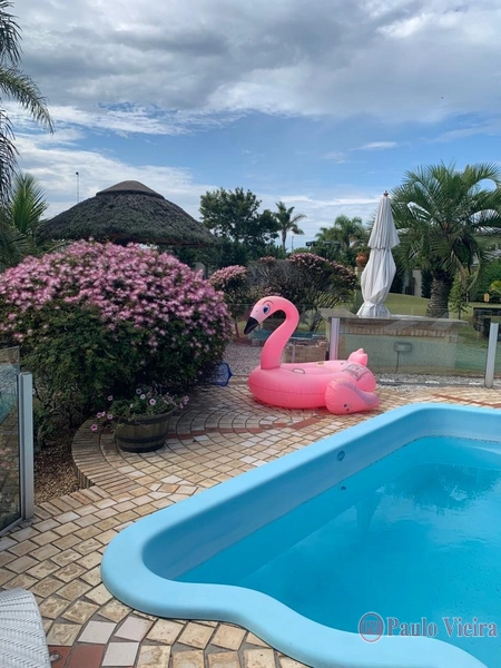 ATLÂNTIDA - ENCANTADORA CASA EM AMPLO TERRENO: 2ª foto da galeria de imagens do imóvel