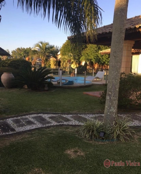 ATLÂNTIDA - ENCANTADORA CASA EM AMPLO TERRENO: 5ª foto da galeria de imagens do imóvel