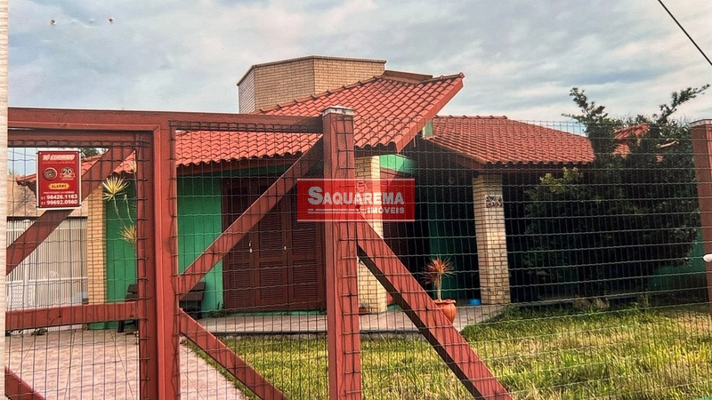 Residência Aconchegante com 3 Dormitórios: 1ª foto da galeria de imagens do imóvel