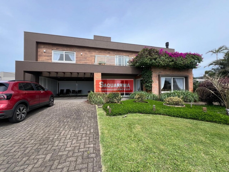 Belíssima casa oferecendo conforto, funcionalidade e lazer.: 1ª foto da galeria de imagens do imóvel
