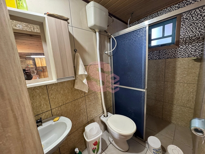 Casa de madeira bem localizada: 6ª foto da galeria de imagens do imóvel