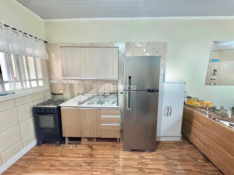 Refúgio e Conforto: Casa Aconchegante com Suíte e Hidro Privativa!: 11ª foto da galeria de imagens do imóvel