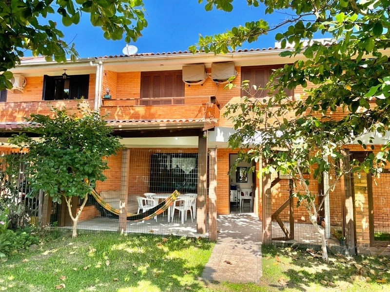 Duplex no centro de Xangri-Lá e junto ao mar.: 1ª foto da galeria de imagens do imóvel