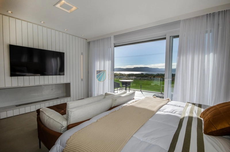 Sobrado novo em condomínio fechado em Capão da Canoa: 45ª foto da galeria de imagens do imóvel