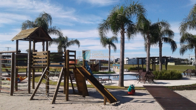 Terreno frente leste e fundos para o lago em condomínio fechado: 3ª foto da galeria de imagens do imóvel