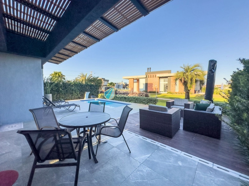 Casa térrea no Riviera em Xangri-lá: 3ª foto da galeria de imagens do imóvel