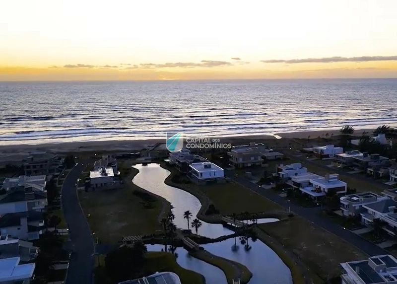Lote beira lago frente ao mar: 1ª foto da galeria de imagens do imóvel