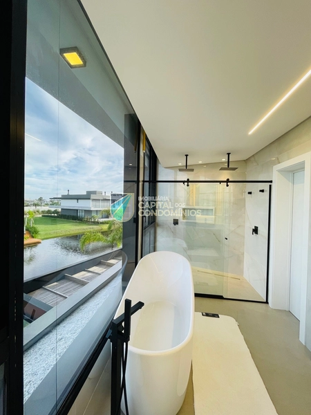 Sobrado mobiliado no Condomínio Sense em Xangri-lá.: 30ª foto da galeria de imagens do imóvel