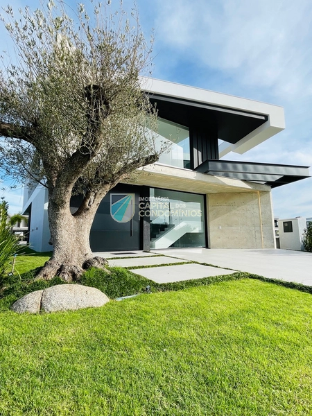 Sobrado mobiliado no Condomínio Sense em Xangri-lá.: 3ª foto da galeria de imagens do imóvel