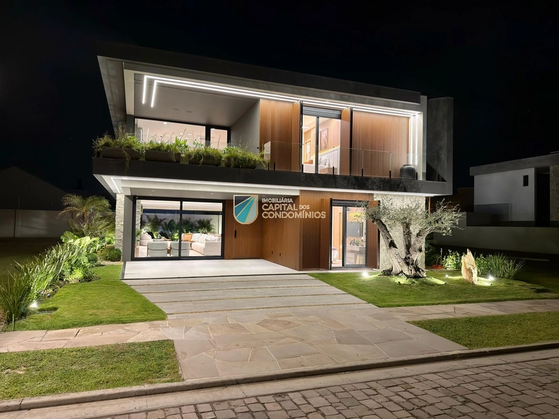 Sobrado mobiliado e decorado no condomínio Los Cobos em Xangri-lá.: 3ª foto da galeria de imagens do imóvel