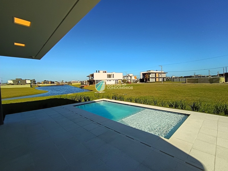 Sobrado mobiliado e decorado no Condomínio Amare em Xangri-lá: 3ª foto da galeria de imagens do imóvel