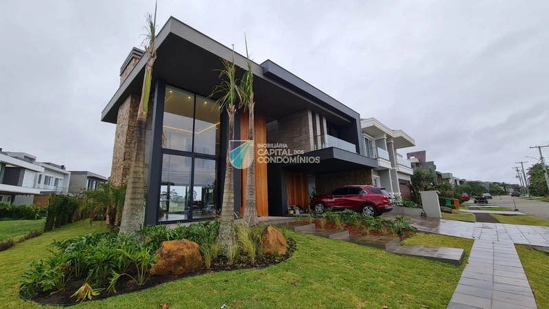 Belo sobrado beira lago no Condomínio Capão Ilhas Resort