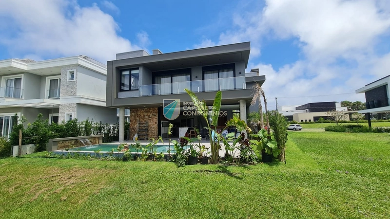 Belo sobrado beira lago no Condomínio Capão Ilhas Resort: 7ª foto da galeria de imagens do imóvel